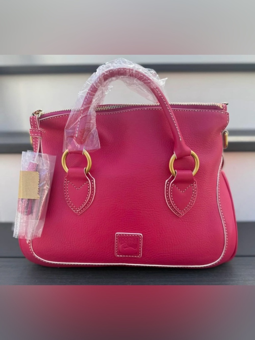 Dooney & Bourke NWT Florentine Edge Satchel in Fuchsia
H 6"× D 5.75" x L 13"